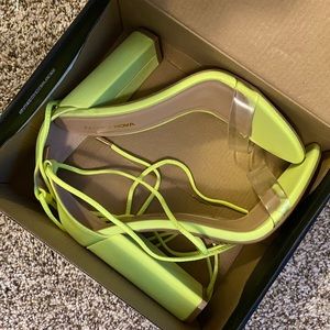 Neon yellow FashionNova strapy heels.